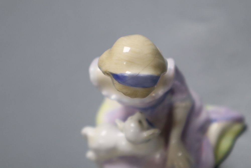 Four Royal Doulton figures, Carpet Seller, Mask Seller, Country Lass, Mary had a Little Lamb